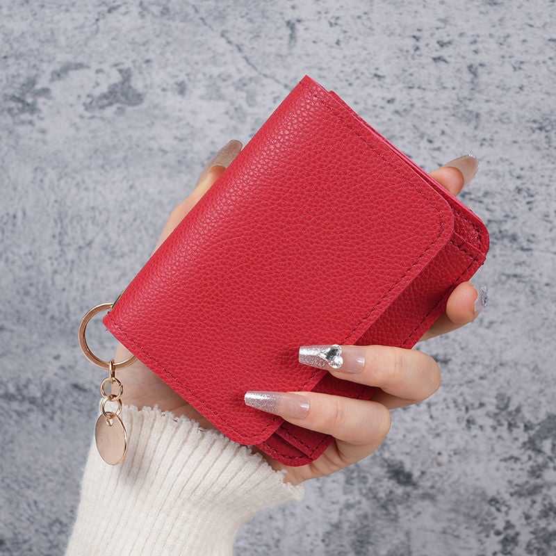 Elegant and Minimalist Women's Slim Short Wallet – with card slots, a bill compartment, and an ID window