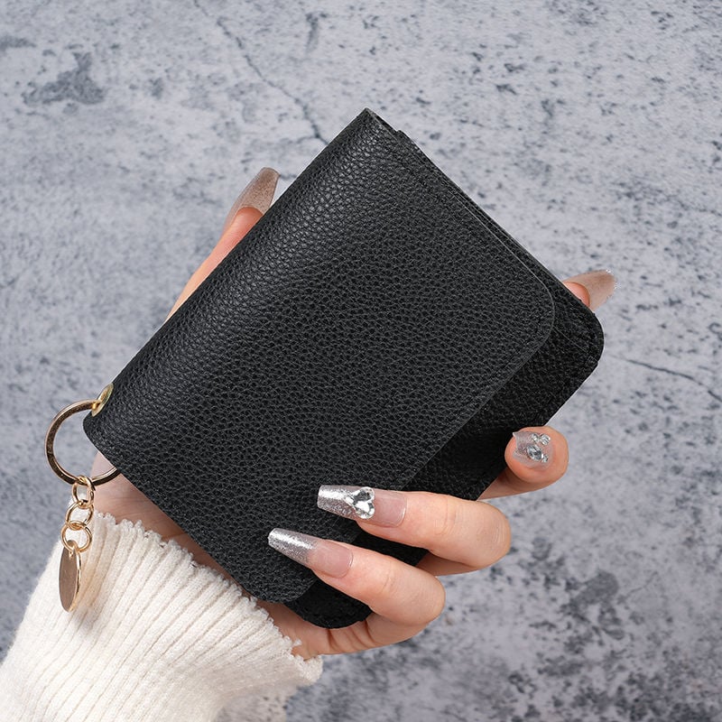 Elegant and Minimalist Women's Slim Short Wallet – with card slots, a bill compartment, and an ID window