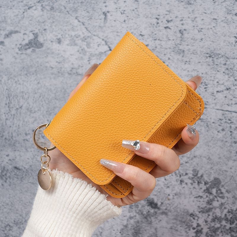 Elegant and Minimalist Women's Slim Short Wallet – with card slots, a bill compartment, and an ID window